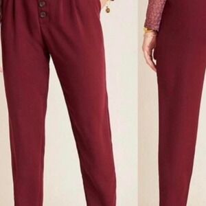 Anthropologie burgundy pleated button front polyester pants women's size 4